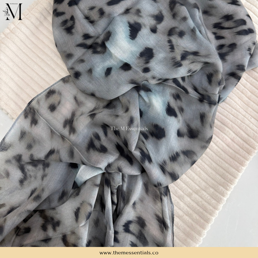 Grey cheetah animal print modal hijab with a grey and black spotted pattern by The M Essentials.